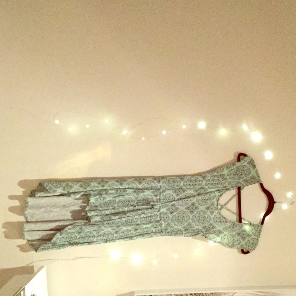 Mint green romper with pretty designs